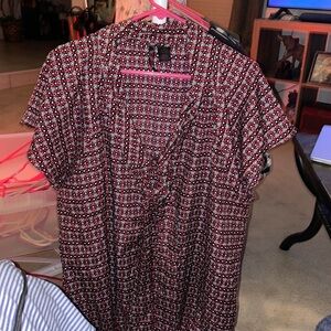 This super fun blouse is TORRID RETRO CHIC